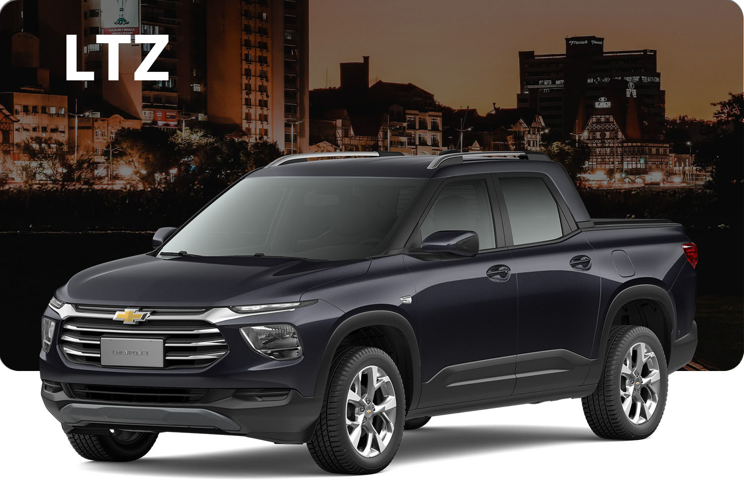 Vista Chevrolet Montana LTZ negra frente a edificios
